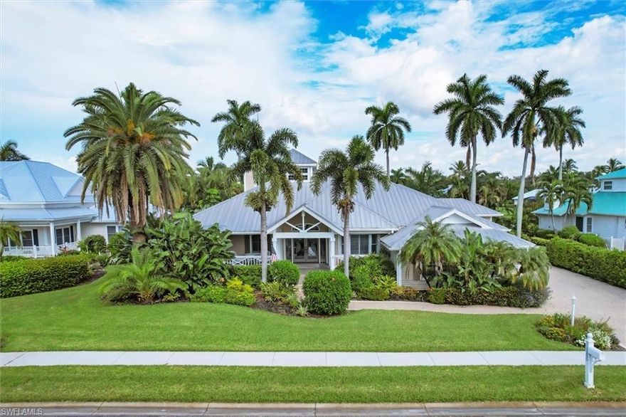 PRESTIGIOUS FORMER MODEL HOME ~ SITUATED ON A BEAUTIFUL 10 ACRE LAKE ~ STUNNING 3 BEDROOMS & 3 BATHROOMS ~ 20 X 40 HEATED POOL ~ 2363 SQUARE FEET OF LIVING AREA ~ PREMIUM LOT (.35 ACRES) ~ OVERSIZED 2 CAR GARAGE w/ NEWER DOORS ~ LOCATED IN GATED COCONUT CREEK ~ MINUTES TO SANIBEL, CAPTIVA OR FT MYERS BEACH ~ EXTRAORDINARY ATRIUM ~ WOOD BURNING FIREPLACE ~ CUSTOM KITCHEN CABINETRY WITH OUTLET PLUGS LOCATED INSIDE ~ PULL OUT & SOFT CLOSE DRAWERS ~ GAS STOVE ~ GRANITE COUNTER TOPS & BACKSPLASH ~ DESIGNER BOSCH APPLIANCES ~ PANTRY ~ CONVECTION & DOUBLE OVEN W/ WARMING TRAY  ~ PLANTATION SHUTTERS ~ CROWN MOLDING ~ TRANSOM WINDOWS ~ HOT TUB ~ BUILT IN OUTDOOR GRILL ~ EXPANSIVE FRONT & BACK BALCONY'S ~ PARTIALLY FENCED YARD ~ NEWER AC ~ METAL ROOF ~ WALK IN CLOSET ~ LOW COMMUNITY FEE'S ~ GATED ~ COMMUNITY CLUBHOUSE ~ COMMUNITY SPA/HOT TUB ~ PICKLEBALL & TENNIS COURTS ~ BIKE, JOG PATHS & SIDEWALKS ~ COMMUNITY GAZEBO ~ BREATHTAKING SUNSET VIEWS ~THIS IS OLD FLORIDA-STYLE AT IT'S ABSOLUTE FINEST ~ SO, HONEY STOP THE CAR - WE JUST FOUND OUR DREAM HOME !!