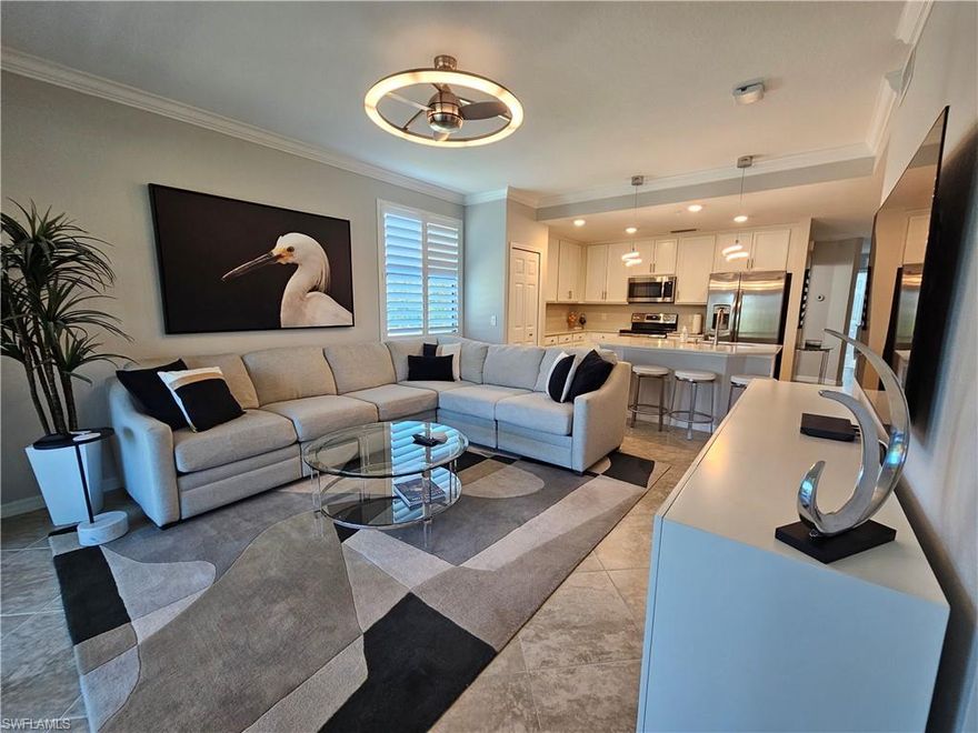 Available December 2026 ($4,000 for the month) and May through November 2026 for a minimum of 30 days ($2,500/mo) as an off-season rental.  No longer available for the months of January through April 2027. ELEGANT TURNKEY END UNIT offering two bedrooms plus den (with sleeper sofa), two full baths and private lanai located in the coveted resort-style, gated community of TREVISO BAY. This light and bright home with modern layout, lighting and furnishings affords more privacy as it is the final building at Trevi with no neighboring building views off the lanai. The amenities package at Treviso includes access to dining at the Clubhouse and casual dining at the lagoon-styled pool, satellite pool with outdoor grill, fitness center & studio, spa, pickleball, tennis, bocce, social events, and golf opportunities at public rates from May 1 through October 31. Treviso Bay is conveniently located with close proximity to 5th Avenue South, Third Street South, fine & casual dining, shopping, the beautiful Gulf beaches, entertainment and more.
