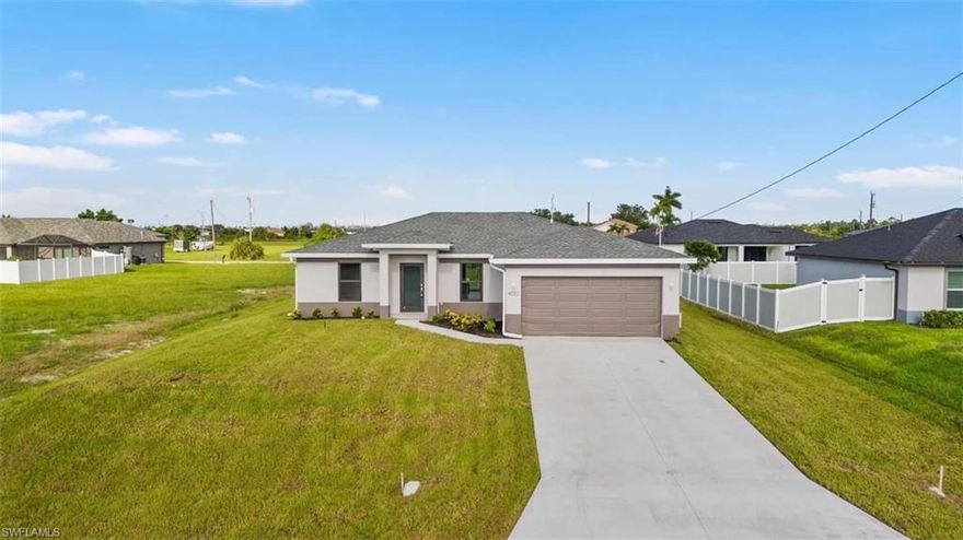 Cute as a button, BRAND NEW COCSTRUCTION home boasts 3-bed, 2-bath property and is nestled in the up & coming Northwest Area of Cape Coral, offering modern living with thoughtful design and components. Step into the alluring contemporary layout with wood-like tile flooring throughout and impact-resistant windows providing safety and energy efficiency. The kitchen is an entertainer's delight, featuring granite countertops, wood cabinets, stainless steel appliances, and a chic glass tile backsplash. The open, bright floorplan allows for maximum interaction when entertaining or enjoying a lazy day at home. Both bathrooms are equipped with premium Moen fixtures for a spa-like feel. This home offers a 2-car garage and a full landscaping package, making this home move-in ready. Additionally, there is ample room for a pool, giving you endless opportunities to customize your backyard oasis. Don’t miss out on this never-lived-in masterpiece – schedule your private tour today!