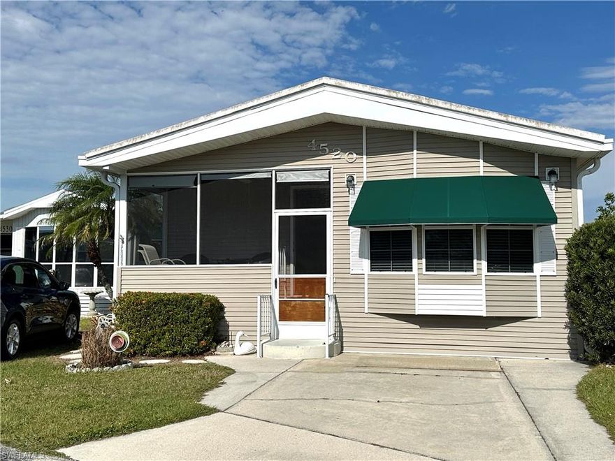 Welcome to your cozy oasis! This delightful 1 bedroom, 1.5 bath mobile home cottage boasts a generously sized living area, perfect for relaxing or entertaining guests. The bright and airy layout creates an inviting atmosphere, while large windows flood the space with natural light. 

You'll love the convenience of having a dedicated laundry room, making chores a breeze. The well-appointed kitchen features modern appliances and ample counter space for meal preparation. 

Step outside to enjoy your private outdoor area, screen porch or paver patio ideal for morning coffee or afternoon happy hours. Located in a friendly  55+ community with residents busy all day every day from pickleball, tennis, shuffleboard, sand and water volleyball, bocce, card playing, dances and much more.  Bring all water toys because boat storage and boat ramp available to residents on the Estero River leading to Estero Bay to Gulf of Mexico. You own your land so come start enjoying the sunny SW FL lifestyle.