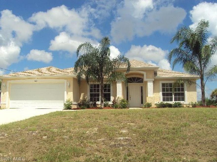 2000 sq ft, 4 bedroom home in quiet NW section of Cape Coral.  Close to all the conveniences of Pine Island Rd while maintaining quiet country living!  16in tile throughout the living areas.  Open floor plan with vaulted ceilings.  Built in work desk in family room area.  Split floor plan.  Currently rented for $1600 a month until the end of March.  Fantastic opportunity to live in one of the fastest growing areas of Cape Coral.