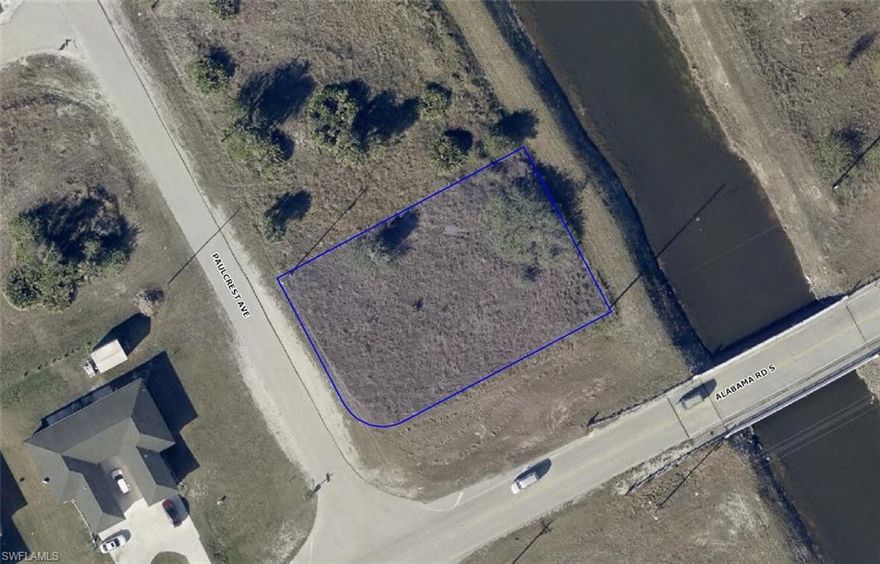 This **CLEARED OFF, CORNER LOT** backs up to a canal in the rear with a large easement that also creates a larger land area! Enjoy a rarity in Lehigh Acres with having a canal in your backyard to have a little Florida water oasis. Located just off Alabama Rd which takes you right to SR-82! Quiet street off the main roads mean little to no thru-traffic! Seller also owns several other lots if interested. Not far to grocery stores, and other amenities. Major airport just a quick drive away (RSW Southwest International Airport), as well as other adventures to explore: Fort Myers Beach, JetBlue Stadium (Home of the Red Sox spring training), Hammond Stadium (Home of the Twins spring training). Activities nearby include Lehigh Acres Community Park North; Lehigh Acres Trailhead Park; Lee County Manatee Park offering waterfront park providing paved trails, up-close views of manatees, an amphitheater & kayak rentals; Caloosahatchee Regional Park with sprawling, nearly 770-acre park featuring trails for mountain biking & hiking plus campsites & more. SW Florida living is truly paradise! Reserve your piece of paradise in the Sunshine State today while prices are still affordable.