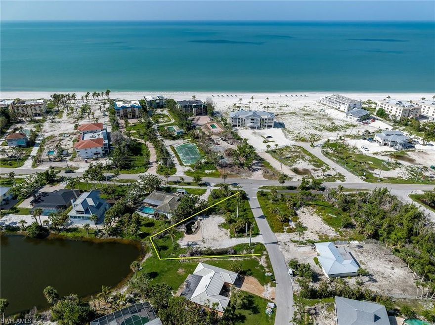 Amazing Opportunity to build your Dream Beach House!! Greeted by mature Royal Palms lining the property. Very Spacious vacant lot just steps to the Beautiful Beaches of Sanibel!! So close to the beach that you can hear the waves!! Spacious lot is overlooking the length of the lake for wonderful serene lake views. Sanibel's well known Bike Path is along the front of the property providing easy bike access to all of Sanibel! Best value for a new home site extremely close to the beach along West Gulf Drive.