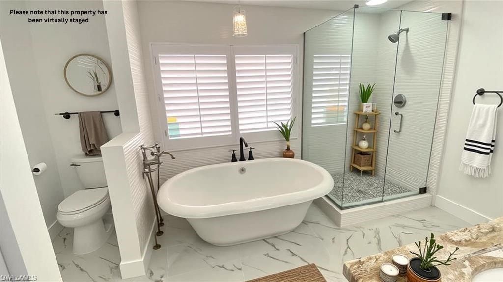 Photo of 718 Reef Point CIR, NAPLES, FL 34108 (MLS # 225047878)