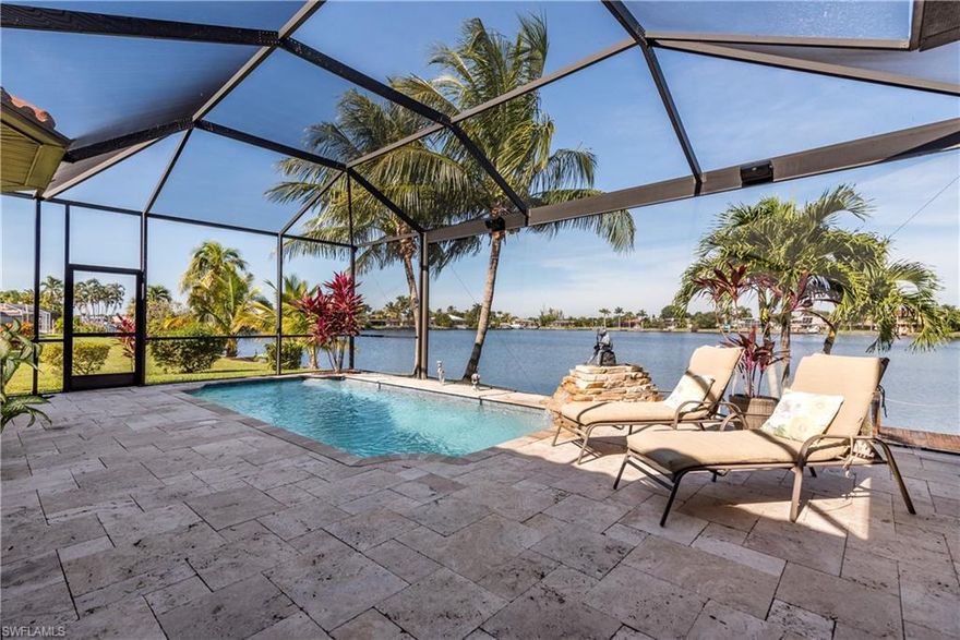 SPECTACULAR $10,000,000+ WIDE WATER VIEWS! THIS STUNNING (3X LOTS) GULF-ACCESS, NEWER BUILT (2012) PGI “ESTATE” HOME ON LAKE THUNDERBIRD IS A 3 BDRM, DEN, 3 BATH, 2 CAR GARAGE (OR ADDITIONAL 3r CAR GARAGE/STORAGE) & POOL. HOME HAS OVER $250,000+/- IN BUILDER UPGRADES AND OWNER UPGRADES. BIG OPEN FLOOR PLAN W/ DIAGONAL TILES THROUGHOUT ENTRY, LIVING, DINING, &, ALL OF the KITCHEN. WALL-TO-WALL STACKING SLIDERS & LOTS OF WINDOWS TO MAKE THE HOME LIGHT–BRIGHT & SUNNY.  MULTI-DETAILED TRAYED & COIFFURED CEILINGS TOPPED OFF W/CROWN MOLDING. "CHEFS" KITCHEN W/WOOD CABINETS, ALL STAINLESS STEEL APPLIANCES, LEVEL 5 GRANITE TOPS, &, COMPLIMENTED BY A SEPARATE “WET BAR”. 2 CENTER ISLANDS W/BAR SEATING. EXPANSIVE “MASTER SUITE” OVERLOOKING POOL & SUPER WATER VIEWS. MASTER BEDROOM HAS HIS/HERS WALK-IN CLOSETS, GRANITE TOPS W/ DUAL SINKS, SOAKING TUB & WALK-IN SHOWER WITH MULTIPLE SHOWERHEADS.  RESORT “STYLE” CUSTOM HEATED POOL W/ “NEW PICTURE WINDOW” SCREEN CAGE W/UNOBSTRUCTED WATER VIEWS & “SUPER” SUMMER KITCHEN FOR FAMILY ENTERTAINMENT. HOME IS CLOSE TO SHOPPING, SCHOOLS, CHURCHES, HOSPITALS, &, THE FAMOUS “TARPON POINT” MARINA & HOTEL HYATT. HOME COMES WITH 1 YEAR HOME WARRANTY.