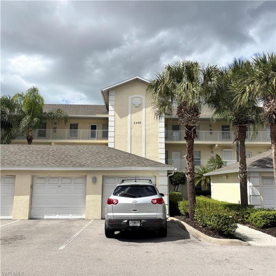 A beautiful 2-bedroom, 2-bath condo with a serene lake view in Cypress Glen. The home features stainless steel appliances and laminate flooring throughout the living area.