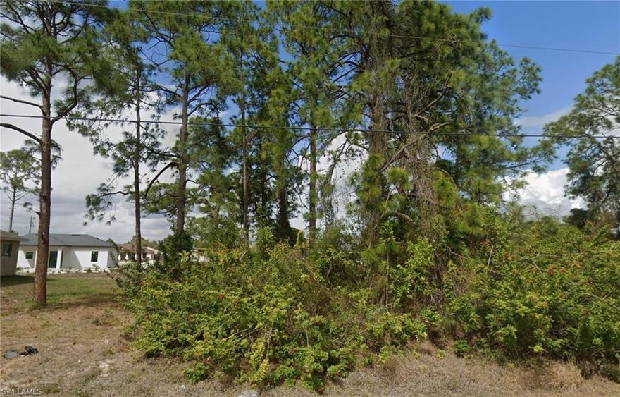 Build your dream home on this beautiful, centrally located lot with quick access to Lee Blvd. You're only 4 miles away from 2 different Publix shopping centers.  Located on a dead end street, you won't have to worry about traffic in your neighborhood.  Peace, calm and tranquility await!  Owner also has 2 other side by side lots in Lehigh Acres for sale at 2706 & 2708 30TH ST SW.