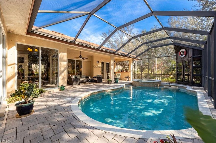 Welcome to the beautiful gated riverfront community of Caloosa Preserve in Alva, Florida! Situated on over one acre and tucked away on a quiet cul-de-sac, this stunning 4 bedroom 2 bath home is surrounded by majestic oak trees and offers the perfect blend of privacy, space, and Florida living.

A long pavered driveway provides ample parking and leads to the home’s welcoming entrance. Inside, you will be greeted by abundant natural light, a formal dining area, and a sitting room ideal for entertaining or relaxing. The split floor plan offers ultimate privacy, with the primary suite separated from the guest bedrooms. The primary retreat features sliding glass doors to the screened pool deck, dual sinks, a soaking tub, a spacious walk in shower, and a large walk in closet.

The kitchen and living room truly serve as the heart of the home, offering beautiful pool views from every angle. The kitchen is equipped with stainless steel appliances, granite countertops, a breakfast bar, and plenty of cabinet and counter space. Each guest bedroom is generously sized, and the fourth bedroom is perfect for a home office, library, or flex space.

Step outside to your private backyard oasis, complete with a screened in pool and spa, plus an outdoor BBQ area on the pool deck perfect for entertaining and enjoying Florida’s year round outdoor lifestyle. There is plenty of room to garden, relax under the trees, or host gatherings in this serene setting!

The detached 20x40 air conditioned shop garage features a 14x14 automatic door, built in vacuum system, and air compressor lines run throughout, making it ideal for hobbyists, car enthusiasts, or anyone needing premium workspace and storage.

Additional features include a whole home reverse osmosis system, newer A/C in 2024, and newer washer and dryer that convey with the property.

Residents of Caloosa Preserve enjoy access to a community boat ramp with easy access to the Caloosahatchee River, perfect for boating and fishing enthusiasts. The location offers the charm of small town living with minutes to local restaurants in Lee County and convenient access to Hendry County for Walmart, Tractor Supply, and countless restaurants, coffee shops, and everyday amenities.

Homes rarely become available in this sought after community. This unique property offers character, functionality, and an exceptional lifestyle, ready for you to call it home. Schedule your private showing today!