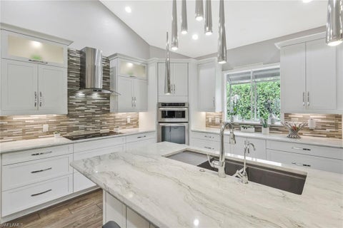 Photo of 730 BAY TREE CT, NAPLES, FL 34108 (MLS # 226011964)