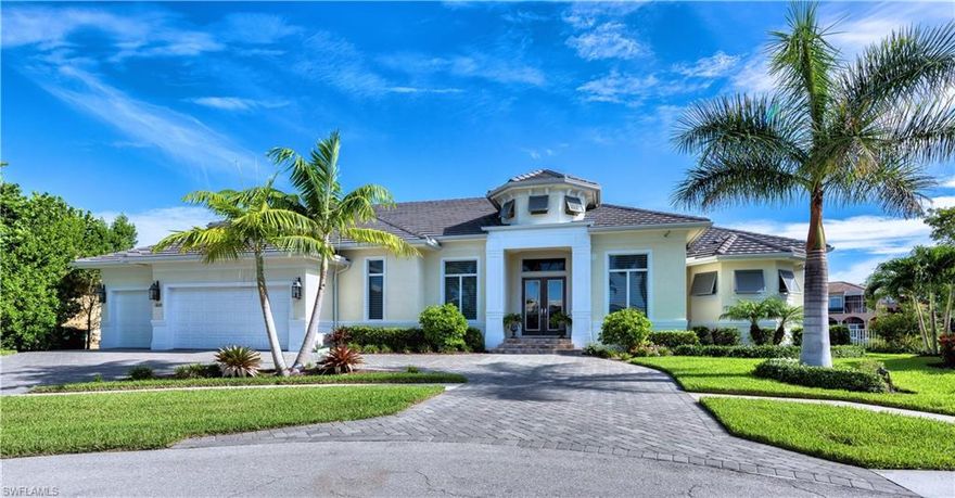 Like new, stunning home by Sunset Builders in 2013 situated on a key lot with direct access to the Gulf of Mexico!  3 car garage, circle drive, 3 zone AC.  With 150 feet on the water, this home comes with a custom dock with 3 lifts (16,000#, 9,000#, & 1,500#) for the avid boater/fisherman to enjoy.  This house has all the "bells & whistles".  Den, Dining room, Family Room, four bedroom suites, four & one half baths, beautiful pool with "sand box ledge", outside fireplace, hurricane shutters/screens, all impact doors and windows, generator, security system, gourmet kitchen, etc.  Professionally designed inside with upscale finishes.  List of features attached.
