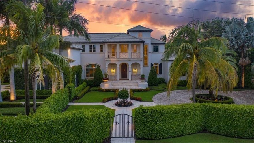 H3041 - SENSATIONAL!!! WATERFRONT location on a gorgeous gated corner double lot w/ the outmost of privacy!  BCB built custom home has many additional extra rooms that enhance today’s busy lifestyles. Custom club/media game room, homework room, exercise room, 5 car garage, 2 boat slips, jet ski ramp. Saltwater pool, large spa, fire pit, Astro Turf grass at pool area.  Custom kitchen & huge island, Dacor double ovens & gas cooktop, 2 dishwashers, SubZero refrigerators, ample cabinetry & 3 pantries.  Your own personal bar that opens directly to the family room.  Large dining room with Venetian plaster walls and views of the front garden.  Owners’ suite is tucked away with seating area, views of the bay and easy access to outside. Sumptuous bath with tiling the colors of the ocean. Her closet is any women’s dream!  The main office with see through gas fireplace and breathtaking views.  Extensive upgrades to the interior include: abundance of millwork, crown and deep baseboards, marble & hardwood flooring in the main areas of the house, tons of extra storage, high ceilings, generator. Freshly painted & meticulously maintained throughout this special one-of-a-kind custom estate home.