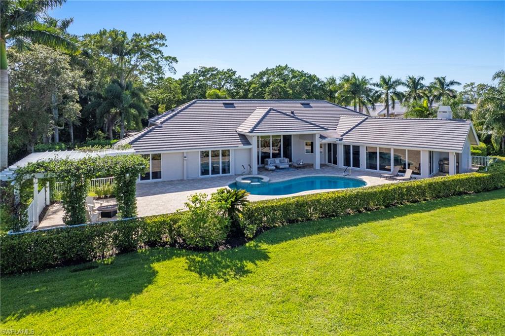 Photo of 4467 Silver Fox DR, NAPLES, FL 34119 (MLS # 225074939)