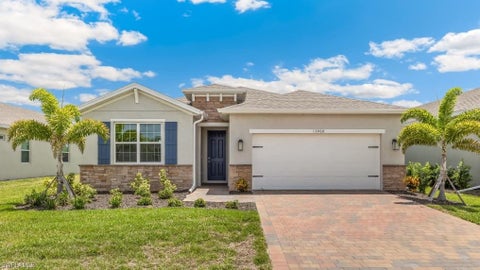 Photo of 18161 LAGOON REACH LN, NORTH FORT MYERS, FL 33917 (MLS # 226029095)