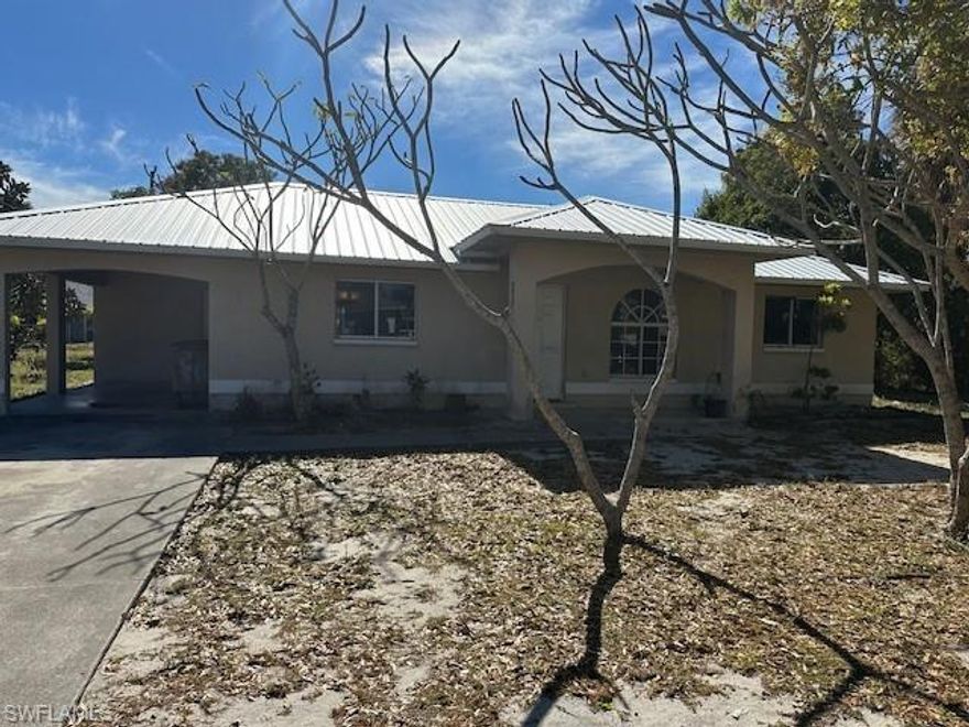 Located close to Downtown Fort Myers, this 3-bedroom, 2-bath home offers a great opportunity for buyers looking to renovate and make it their own. With 1,113 sq ft, the layout includes two full bathrooms, each featuring a tub/shower combo and single-sink vanity, a Living/Dining great room, with galley kitchen including a pantry and indoor laundry . Priced to reflect current condition, this property is a true blank canvas ready for your updates and finishing touches. Major improvement already completed with a newer metal roof installed in 2023—one of the biggest expenses already done. Sold AS-IS.