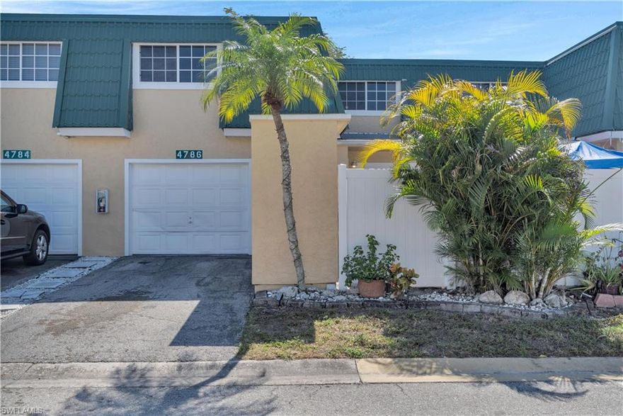 This centrally located 4 bedroom, 2.5 bath Fort Myers home sits in one of the most convenient areas of Lee County, just minutes to Downtown Fort Myers, the Cape Coral bridges, and Southwest Florida beaches. Daily life here is easy — grocery stores, restaurants, and shops are close enough to walk or bike to, a rare find in this area.

Inside, the home offers a functional layout with spacious living areas, a mix of hardwood and tile flooring, and a dedicated laundry room. The private garage adds valuable storage and convenience, while the private, fenced courtyard creates a comfortable outdoor space for relaxing or entertaining.

The established community features mature trees and open green space not typically found in newer developments, giving the neighborhood a quieter, more residential feel while still being incredibly central.

The A/C system was replaced in October 2024, providing added comfort and peace of mind for the next owner.

Whether you're looking for a primary residence, seasonal home, or investment property, this location makes it easy to enjoy everything Fort Myers has to offer — shopping, dining, river district events, and beaches — all just a short drive away.