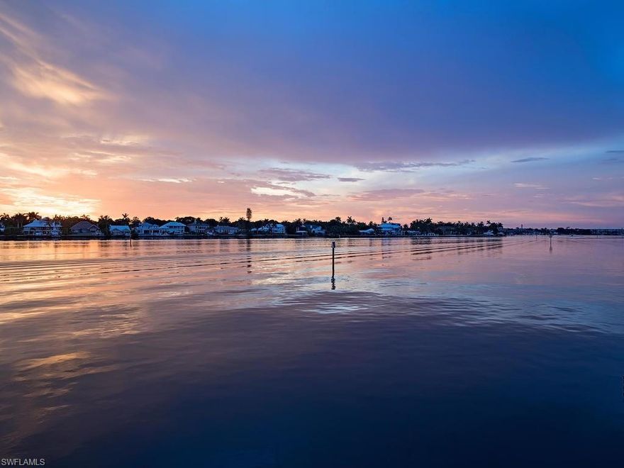 H.12169 A picturesque location to watch the breathtaking sunsets over Naples Bay in the highly sought after neighborhood of Royal Harbor.  This water-front property offers uninterrupted views of the bay from all main living spaces, the master bedroom and the outdoor living space featuring an oversized pool. Complete with a private boat dock and lift, this home is the definition of a boater's paradise.  Come in off the water and relax in this waterfront property where all design elements revolve around the number one selling feature of this house, location!