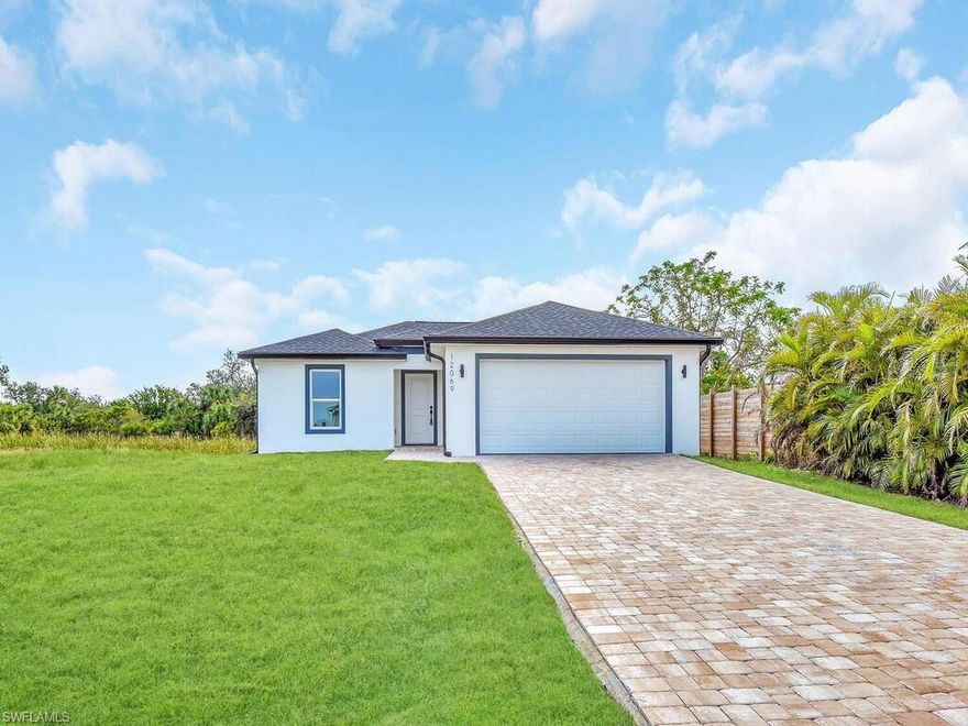 Brand-New Construction in Port Charlotte – Move-In Ready!

Welcome to this stunning 3-bedroom, 2-bath home featuring a thoughtful open floor plan and modern upgrades throughout. From the moment you step inside, you'll be captivated by the beautiful laminated tile floors that flow seamlessly through the home, adding warmth and elegance.

The heart of the home is the chef's kitchen, fully equipped with stainless steel appliances, an oversized island, and ample cabinetry—perfect for preparing meals or gathering with friends and family. The spacious living and dining area provides the ideal layout for entertaining or simply enjoying everyday moments.

Retreat to the primary suite, a serene oasis with a spa-like bathroom showcasing a shower, dual sinks, and luxurious finishes. Two additional bedrooms offer flexibility for guests, a home office, or a growing family.

Step outside to the large backyard, perfect for creating your dream outdoor space. This home also includes an attached 2-car garage for convenience and impact windows for added safety and energy efficiency.

Don’t miss the opportunity to own this brand-new home in the desirable Port Charlotte area! Schedule your private tour today!