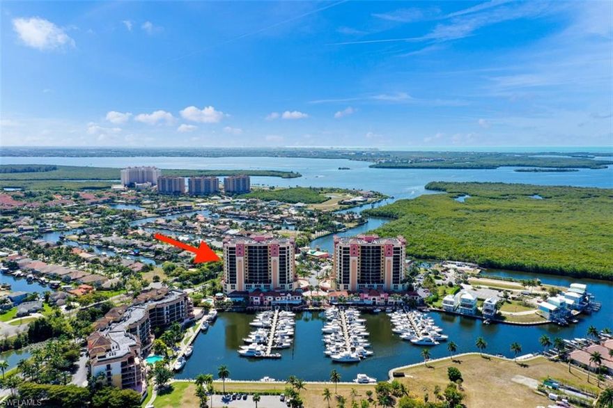 Located in the prestigious Cape Harbour Marina this large 9th floor corner unit offers you amazing marina and sunset views.  See drone video / virtual tour.  This vibrant waterfront community offers you boating, kayaking as well as fine dining, bars and shopping all at the footstep of this building.  Other community features include a fitness center, two swimming pools, tennis, basketball as well as a playground for the little ones!  This suite is being sold turnkey with all the items you need to move in tomorrow!  The suite has 3BR and 2Baths, offering you almost 1,800 Sq Ft of living space plus secure parking on the 3’rd and 4th levels of the parking deck.  The recent updates in the suite include replacing the carpet, repainting the unit as well as replacing new trim and new doors.  This large suite can make a perfect primary residence or be utilized as an investment for rental purposes.  Enjoy walking to the many retail shops, or dining at Rumrunners, Fathoms, or the Cape Harbour Oyster Bar & Grill restaurants.  Located less than 10 minutes from the Cape Coral Entertainment District or about 25 minutes from the downtown Fort Myers Entertainment Districts.  Why wait, call today!