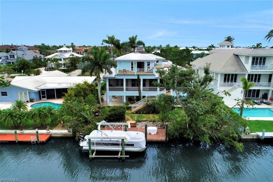 Live the dream in this beautiful waterfront home.
Nestled on a pristinely-manicured lot only a stone’s throw from Naples Bay you will find this exquisite home offering value beyond compare. Brazilian cherry flooring greets you as the entertaining-inspired design brings you through the great room to the dining area and covered lanai. The master bedroom features a two-tier deck to enjoy your morning coffee - or a nightcap while taking in Naples Bay sunsets. Whether you desire to go downtown via car or to the gulf for a sunset cruise, an evening out is only moments away. An extensive list of features is available upon request.