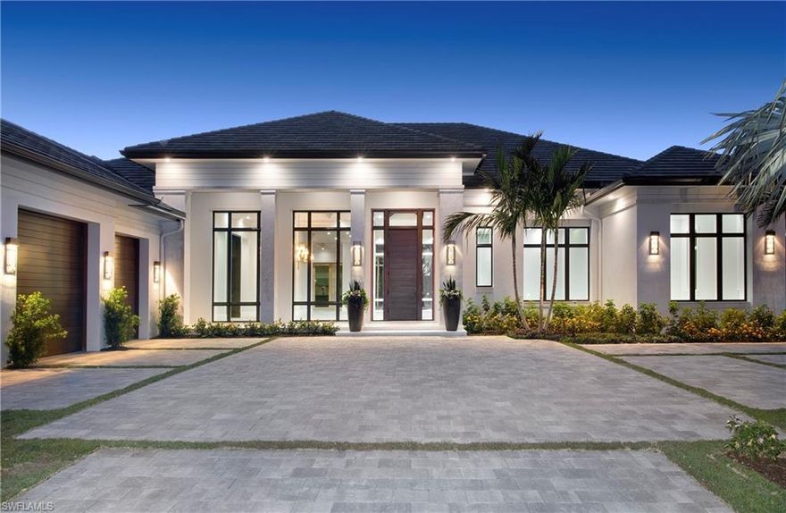 Breathtaking lakefront coastal contemporary estate. Designer details astound from the moment you enter the home. Floor-to-ceiling glass windows flood the home with natural light. With wide plank Italian oak floors throughout, the chefs kitchen and butler’s pantry make this home an entertaining dream come true. Four en suite bedrooms, an indoor and an outdoor great room, family room, kitchen, office, butler’s pantry, and 3 car garage all over look a gorgeous water view. Enjoy every upgrade imaginable. Situated on the cul-de-sac on a quiet street in Pelican Bay, moments from Waterside, Artis Naples, Mercato. Pelican Bay offers miles of sandy beach, 2 beach clubs with dining, cocktails, and beach service; a competitive tennis program; paddle boards, kayaks, fitness center, and the brand new Club Pelican Bay featuring award winning restaurants, 27 holes of golf, member fitness center and spa.