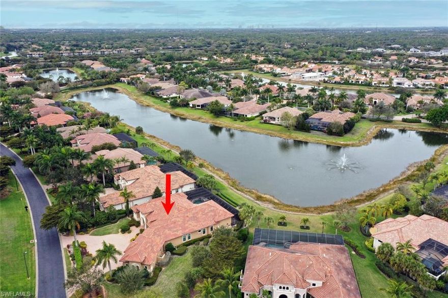 OUTSTANDING CLASSIC STYLE 4 BEDROOMS, OFFICE, 4.5 BATHS HOME ON ONE OF THE LARGEST LAKEFRONT LOTS! Baby grand piano sets the tone for this classical design WITH HIGH CEILINGS, WOOD AND TILE FLOORS, from formal to casual living. Separate dining room, custom wet bar / wine cooler makes entertaining so easy. You’ll love the kitchen with center island, walk in pantry and rich wood cabinets. All the appliances by Viking and “yes” Natural Gas cook top! Seating at bar, plus breakfast nook with bay window overlooking spectacular lanai & pool. Best of all the family room with high impact sliding glass doors that pocket back and open to fun-time huge resort lanai with bar, outside kitchen, pool, spa, and burning bowls. Luxurious primary suite/a sumptuous bath/ separate tub and walk-in shower, dual sinks & designer lighting. Tile, and woods floors throughout, niches and custom plantation shutters.Three en-suites all / custom closets. Spacious sunny laundry room/sink, built-in ironing board, and wood cabinets. oversized 3- car garage /AC closet with an extra washer/ dryer. Social memberships include Country Club, Fitness Center, Tennis, pickle ball, Bocce Ball, & private beach club.