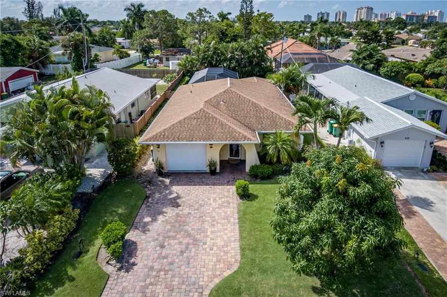 Great Naples Park Home with a Pool. This property features 3 bedrooms and 2 full bath. Lush landscaping, 6ft trek privacy fence, whole house generator. Brick pavers, tile on diagonal irrigation on well. Great weekly rental income. Tenants rights for 2019-2020 seasonal renters already booked.