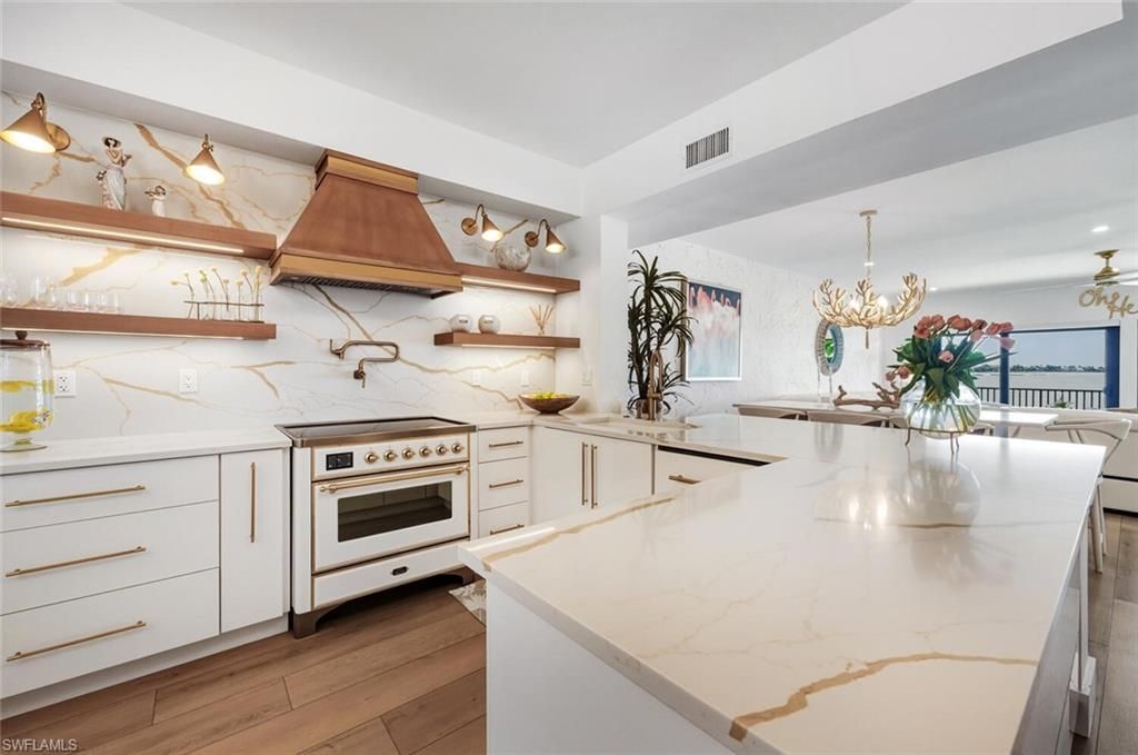 Photo of 601 La Peninsula BLVD #601, NAPLES, FL 34113 (MLS # 225083991)