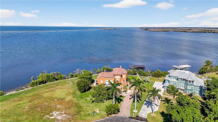 “GALT ISLAND" "VILLA MEDICI" IS A GATED, PRIVATE WATERFRONT ISLAND RETREAT” ON (3/4 AC+/-) OF UNOBSTRUCTED SPECTACULAR $10,000,000 WIDE BAY VIEWS ALMOST AS FAR AS THE EYE CAN SEE! THIS EXTRAORDINARY PRIVATE ESTATE HOME & NATURE RETREAT HAS IT ALL!!  CUSTOM BUILT (1997) ARCHITECTURAL "AWARD WINNING" HOME WAS COMPLETELY REMODEL 2024 AND HAS OVER ($1,250,000+/-) IN TOTAL BUILDER/OWNER UPGRADES, RENOVATIONS AND REMODELING. WITH SOUTHWESTERN EXPOSURE 5 BEDROOM, LOFT, 4 BATH, 3.5 CAR GARAGE, POOL-SPA HOME OFFERS STUNNING 180 DEGREE WIDE PINE ISLAND SOUND VIEWS AND OVER 3800 SQUARE FEET OF LIVING SPACE. HOME IS COMPLETELY BLOCK BUILT AND DESIGNED TO WITHSTAND CATEGORY 5 HURRICANE. WITH SOARING 35' CEILINGS THE LIVING ROOM IS THE CENTER-PIECE OF THE HOME AND FEATURES A CUSTOM BUILT 30' STONE FIREPLACE FOR THOSE INTIMATE FAMILY & FRIENDS GATHERINGS. PINE ISLAND SOUND OFFERS UNMATCHED BOATING & AWARD-WINNING WORLD CLASS FISHING AND EASY ACCESS TO SANIBEL'S "FAMOUS BEACHES"! IF NATURE IS IMPORTANT THEN YOU CAN WATCH DOLPHINS & MANATEES PLAYING AT YOUR DOCK, EXOTIC BIRDS, EAGLES AND OTHER ISLAND WILDLIFE AND NOT TO MENTION STUNNING "SUNSETS" UNMATCHED ANYWHERE. GORGEOUS CUSTOM HARD WOOD FLOORS, CHEFS KITCHEN W/CUSTOM WOOD CABINETRY, STAINLESS STEEL APPLIANCES, HUGE WALK-IN PANTRY AND ALL TILE TOPS. HOME IS DESIGNED TO BE “MAINTENANCE FREE” ALL WINDOWS AND DOORS ARE “HURRICANE” IMPACT RESISTANT AND THE WHOLE HOME HAS IN CEILING "FIRE SPRINKLER" ALARM SYSTEM . BOTH MASTER BEDROOMS HAVE HIS/HER WALK-IN CLOSETS, STUNNING BAY VIEWS, DUAL CORAL STONE TILE SINKS, JETTED TUB & WALK-IN SHOWER. HOME HAS 2 COVERED/PROTECTED BOAT HOUSES & 2 LIFTS (10,000 LB EACH) (2024 26'  EXPRESS W/250HP YAMAHA, AVAILABLE SEPARATELY) ALSO HOME HAS 8000 WATT GENERATOR FOR ANY STORM OUTAGES. 1ST LEVEL UNDER HOME WAS RECENTLY REMODELED, HAS 2 ADDITIONAL GUEST BEDROOMS, BATH AND LOUNGING AREA AND OPENS TO THE EXPANSIVE POOL DECK AND COVERED LANAI OVERLOOKING THE BAY.  ADDITIONALLY 3.5 CAR GARAGE, ISLAND GOLF CART, FINISHED EPOXY FLOORS AND ADDITIONAL WORKSHOP AND FISHING & TACKLE STORAGE ROOM. ST. JAMES CITY ON PINE ISLAND, IS JUST LIKE LIVING IN FLORIDA KEYS, KEY WEST, CAPTIVA & SANIBEL. WHEN YOU LIVE HERE, YOUR MORNING AND EVENINGS WILL NEVER BE DULL WATCHING “SUNSHINE” THE DOLPHIN & “MATTY” THE MANATEE WHO CALL "VILLA MEDICI" HOME AND PLAY IN THE WATERS BEHIND THE HOME. THIS HOME IS ONLY FOR THE MOST DISCERNING BUYER. YOU ENTER "GALT ISLAND" THROUGH A PRIVATE GATE THEN YOU FOLLOW THE PRIVATE ROAD THROUGH ONE (1) MILE OF EAGLE, MANATEE AND DOLPHIN SANCTUARY AND PRESERVE. HOME COMES WITH ONE YEAR "HOME WARRANTY" FOR TOTAL BUYER COMFORT! SHOWN BY APPOINTMENT ONLY.