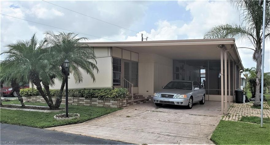 Buyer's financing fell through. SPACIOUS Doublewide offered fully-furnished Ready for YOU to move in! Own your land AND this WELL-MAINTAINED 2 BR 2BA Ideally located on a QUIET street with no thru traffic. Kitchen features dishwasher, microwave, pantry, glass-top stove & lots of counter-space. Lustrous wood laminate floors throughout. Washer & Dryer conveniently located in the breezeway shed. Awnings for weather protection & energy savings. 1100+ sq ft of air-conditioned living space! Sound roof; solid floors; all systems functional. Enjoy maintenance-free affordable living in the Sunshine State~no state income tax; LOW monthly fee $155 includes recreation facilities, grounds maintenance, trash pick-up. Low cost RV & boat storage onsite. Walk to the pool & enjoy a friendly 55+ community w/2 clubhouses, community swimming pool, shuffleboard, ponds, parks, nice landscaping & streetlights. Property conveys Turnkey as seen in photos, including TVs and shed contents. Optional Share Certificate is available as a separate purchase. You own the land whether you have a share or not.