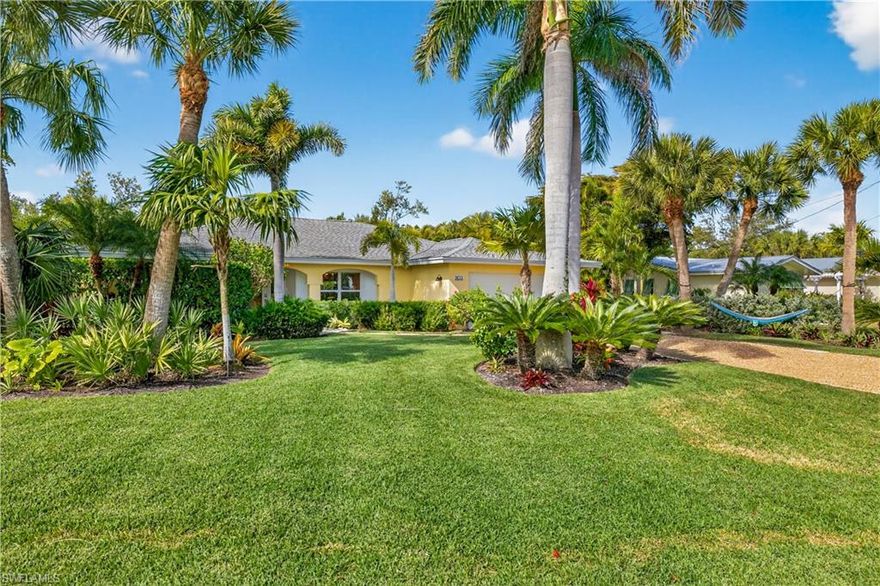 Perfectly positioned on a canal on Sanibel Island’s highly sought-after East End, this meticulously renovated, ground-level residence offers the ultimate blend of waterfront living, walkability, and effortless island access with NO HOA. Just steps from local favorite Grandma Dot’s, located at the Sanibel Marina, you’ll enjoy waterfront dining and lively boating activity right outside your door. A short stroll brings you to the East End Village, where you can enjoy breakfast, lunch, local shops, and ice cream, or hop on your bike for an easy ride to the historic Sanibel Lighthouse and fishing pier. Known for its relaxed pace and unmatched convenience, the East End is a favorite for morning walks, dog-friendly streets, bike rides, sunrise views, and shelling along the beach, without the congestion found elsewhere on the island. The home itself has been completely redone and is truly move-in ready. Lush, tropical landscaping creates a private retreat, while the southern-exposure offers sun-filled days in a serene setting. A salt-water pool with heater and outdoor shower enhance the outdoor living experience. A private waterfront dock provides direct access to world-class Back Bay fishing and boating to waterfront dining destinations only accessible by water. Inside, the residence is light-filled and thoughtfully designed, featuring beautiful wood-look tile flooring throughout, abundant recessed can lighting, and an open, airy layout that enhances everyday living. The split floor plan offers privacy and functionality, with three spacious bedrooms plus a den, creating flexible living space ideal for full-time residents or seasonal use. Updated kitchen and baths showcase a coastal, island-inspired design, while impact-resistant windows and doors provide peace of mind, complemented by a FEMA-approved, state-of-the-art water intrusion prevention system. Every detail, from interior finishes to exterior spaces, reflects pride of ownership and meticulous care. An exceptional opportunity to own a beautifully updated waterfront home in one of Sanibel’s most convenient and desirable locations, offering outstanding value for the lifestyle, setting, and amenities it delivers.