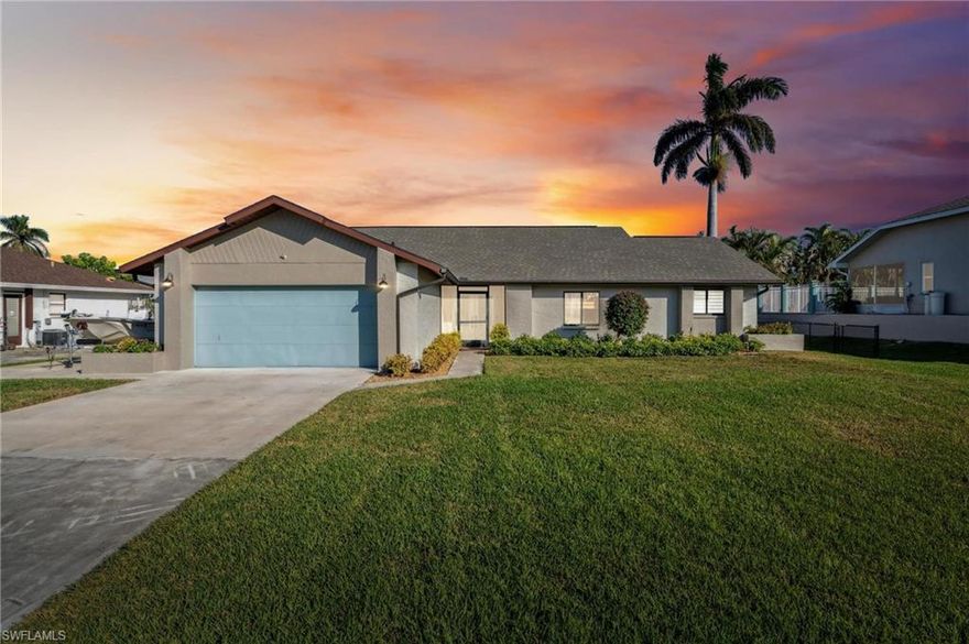 Welcome to this stunning home in the centrally located, gulf-access Island Park Woodlands community! Fully remediated after Hurricane Ian, this unique home provides a beautiful coastal feel with all new custom finishes. As you enter the foyer, you are greeted with vaulted nickel joint ceilings, finished with beautiful wooden beams. Some amazing features offered in this home are the oversized granite island and custom-built bar with seating area creating the perfect combination for entertainment. Crown molding and wood-look plank tile flooring is offered throughout the home providing beautiful consistency. The master suite offers dual sinks, a walk-in closet, and a walk-in shower with custom tiling. This home offers two extra bedrooms perfect for hosting guests or extra space for an office or exercise room. The guest bathroom includes a luxurious soaking tub, perfect for unwinding. Out back, you have a fully screened in patio and fenced in yard providing added privacy. The extended driveway offers added space and parking your RV or boat and provides a 50-amp hookup for an RV. Both roof and A/C were installed in 2021. Schedule your private showing today!