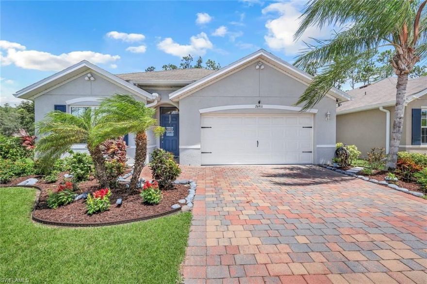 Welcome to this exquisite 4-bed, 2-bath home boasting an open floor plan, gracefully situated in the charming Wildwood Preserve community. Prepare to be enchanted by the tranquility of your own private woodland view, complemented by an extended lanai that offers an upgraded No See Um proof screen enclosure, built to withstand hurricane-force winds of up to 145 mph. Ensuring your peace of mind, this residence features a low-profile roof meticulously designed to safeguard against the rigors of hurricanes and storms. Embrace comfort year-round with solar tint film-adorned windows that keep the interior cool. Tucked away at the end of a serene and quiet street, relish the added tranquility and space provided by the adjacent open grassy area—a slice of untouched nature that promises privacy and will never be developed. Nestled within the coveted Wildwood Preserve community, this haven is just a short distance from the allure of pristine beaches, shopping destinations, dining, and an array of entertainment options, including the new Midtown at Bonita. Don't miss the chance to experience the finest in Florida living.