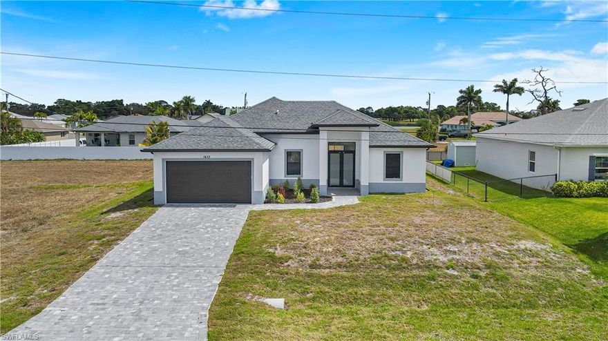 Brand-New Construction – Move-In Ready with Flexible Financing Options

Discover modern comfort in this newly built 4-bedroom, 2-bath home located in a growing area of Northwest Cape Coral. Designed with a bright open layout, the home features high ceilings, large-format tile flooring throughout (no carpet), and contemporary finishes.
The kitchen offers quartz countertops, a spacious island, modern cabinetry with soft-close drawers, and plenty of space for entertaining. The primary suite includes dual walk-in closets, double sinks, and a floor-to-ceiling tiled walk-in shower.
Additional highlights include tray ceilings, recessed lighting, LED ceiling fans, 8-foot interior doors, 6-inch baseboards, and a finished two-car garage with epoxy flooring. Enjoy outdoor living with a covered lanai and room to create your ideal backyard space.
Conveniently located near Coral Oaks Golf Course, parks, boat ramps, and shopping.
Buyers may bring their own financing, and owner financing is also available for qualified buyers.
Schedule your private showing today.