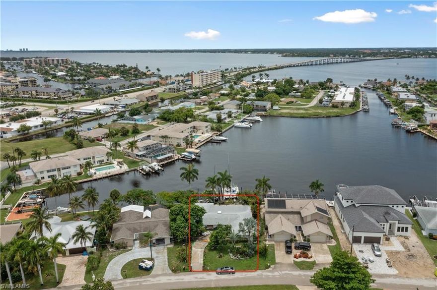 INVESTORS DREAM! PRICED WELL BELOW LAND VALUE! BEST OPPORTUNITY IN CAPE CORAL! Stunning views of Bikini basin with direct sailboat gulf access. This flooded and destroyed property has tons of potential. Either tear down and build new or renovate the existing 3 bedrooms, 2.5 bathrooms, 2,500 SQFT+ pool home. Roof installed in 2022. Act fast, this one won't last. CASH ONLY. DO NOT WALK AROUND THE PROPERTY WITHOUT CALLING THE AGENT.
