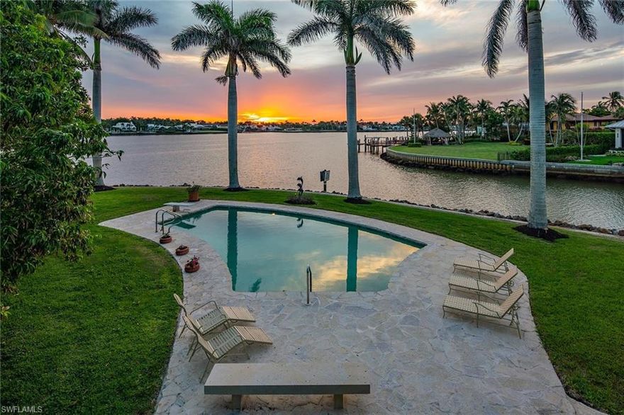 An exceptional opportunity awaits you – a nearly double lot boasting 259 feet of captivating bay frontage with a coveted western exposure. Step onto this magnificent property, and you'll be greeted by a sense of exclusivity. The expansive property spans an impressive area of .51 acres, providing ample space for creating your ultimate waterfront residence, where every day is greeted by panoramic views of the serene bay and the vibrant sunsets. For boating enthusiasts, the bayfront location offers direct access to the sparkling waters of the Gulf of Mexico and your own private dock for you to explore the coastline at your leisure. Don't miss the chance to own this extraordinary property in Royal Harbor, where the allure of waterfront living, combined with the close proximity to Naples’ finest shopping and dining venues create an unrivaled resort living experience.