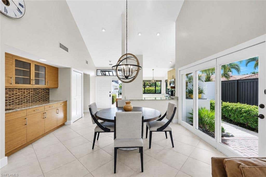 Photo of 529 Bay Villas LN, NAPLES, FL 34108 (MLS # 226030045)