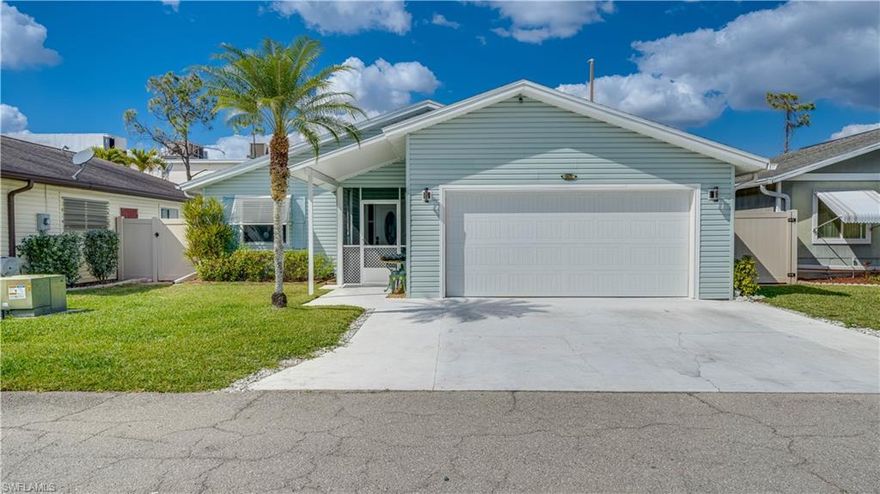 Located in the highly desirable Foxmoor Lakes single-family home community, this beautifully updated two-bedroom plus den, two-bath residence offers just over 1,800 square feet of light-filled living space designed for buyers seeking move-in-ready Florida living with strong long-term value. Situated on a quiet, quaint street just a short walk from the waterfront amenities, this home combines modern upgrades, flexible living space, and access to direct Gulf boating in one of the area’s most sought-after communities. From the screened front porch entry, you’re welcomed into a spacious open-concept floor plan filled with natural light and enhanced by luxury vinyl plank flooring throughout the main living areas, upgraded tall custom baseboards, and a clean, contemporary finish. The split-bedroom layout provides privacy, with an oversized primary suite featuring an exceptionally large walk-in closet and private access to the expansive Florida room. Both bathrooms have been tastefully updated with walk-in showers for a sleek, low-maintenance design. The secondary bedroom also offers a generously sized walk-in closet, while the den provides flexibility for a home office, guest room, or media space—ideal for today’s remote work or seasonal living needs. The kitchen is designed for both function and style, featuring quartz countertops, soft-close cabinetry, stainless steel appliances (2023), a large farmhouse sink, and an inviting sit-in dining area that flows seamlessly into the main living space—perfect for entertaining or everyday comfort. The oversized Florida room extends the living area dramatically and offers two separate exits to the outdoor patio, creating the ultimate indoor-outdoor lifestyle experience. Step outside to a warm, inviting patio and fenced backyard (2023) surrounded by mature landscaping, providing privacy and room to relax or entertain. Major improvements offer peace of mind for buyers and investors alike, including a new roof (2020), tankless water heater (2023), updated appliances (2023), and numerous interior renovations completed within the past few years. Underground utilities enhance the community’s clean aesthetic. Foxmoor Lakes is known for its low HOA fees and exceptional amenities, including three community pools, clubhouse, pickleball and tennis courts, bocce ball, and a community boat dock with boat slips available for monthly rental. Nine boat slips sit on a direct-access canal, offering convenient access to Southwest Florida’s world-class waterways. Whether you’re searching for a primary residence, seasonal retreat, or investment property with boating access and resort-style amenities, this home checks the boxes for condition, community, and location.