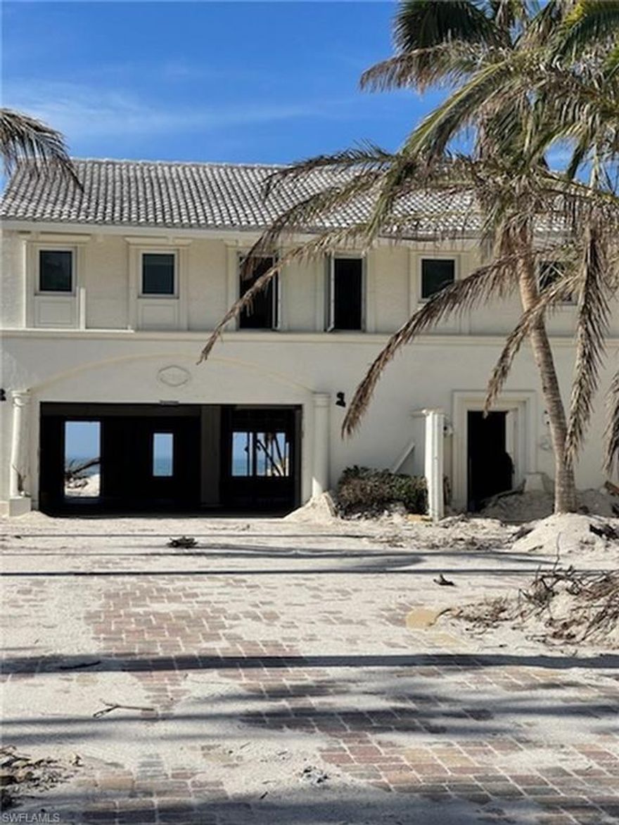 This is the lot you have been waiting for on Bonita Beach.  It's location provides one of the largest building envelopes on Bonita Beach.  The Buyer is responsible to tear down the existing house that was damaged in Hurricane Ian and Sold as-is.  No Beach erosion issues on this lot.