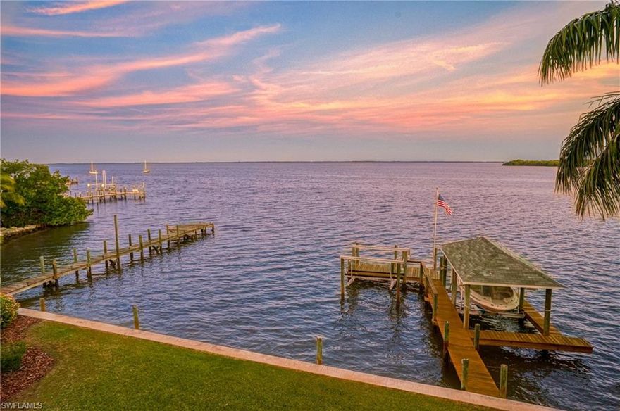 As featured in the WSJ. An exceptional and rare offering with awesome views across Pine Island Sound from this magnificent residence in the heart of the Village with room for the whole family. As you enter this commanding residence your eye is drawn straight out to the bay for endless views. With the walls of glass and volume ceilings incorporated into this open floor plan this home is ideal for today's island style living ,as it brings the outside in. Boundless amounts of wildlife frequent this location daily on the bay and you are also only steps from the beach access next to the library. With this split floorplan all guests enjoy privacy and the master is well separated as well with serene views. There is a completely separate apartment on the south east wing of the home which could be ideal for live-in family or a caretaker. An extraordinary home, built like a fortress and is available to the discerning buyer who is looking for space, integrity ,walking distance to the village ,boating and beach access. Kingfisher Vacations estimates that this home would gross between $175,000 and $225,000 yearly in rentals.