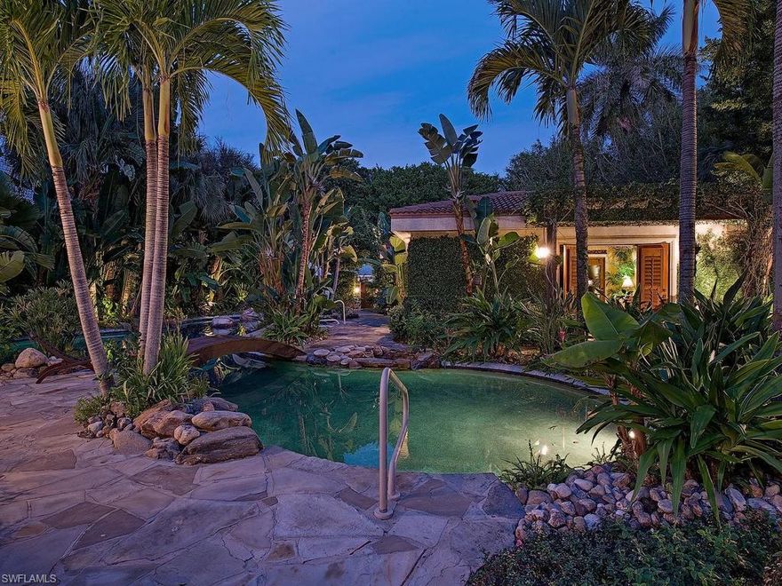 A ROMANTIC TROPICAL HIDEAWAY, steps from the Gulf of Mexico! Quietly enveloped behind a privacy wall, "Casa de Pina" (Pineapple House) offers a charming, secluded, compound, in perfect harmony with nature, where you will find the swimming pool, nestled between the main house and separate guest house, surrounded by lush gardens. Outdoor fireplace creates a wonderful ambiance in the dining terrace, perfumed with a jasmine-covered pergola, creating a flowery covering from the sun.  French doors open from the master bedroom, guest house and spare bedroom  allowing the interior spaces to flow seamlessly into the outdoors. The master bathroom boasts a sunken tub and private outdoor shower, with peaked ceilings in living and master bedroom, reminiscent of British West Indies hideaways. A second fireplace can be found in the casually elegant,  expansive living area, with gourmet kitchen, wood and travertine floors and a full butler's pantry, perfect for those who enjoy entertaining.  Upstairs, one finds a hidden playroom, and an immense but elegantly cosy living area with a bourgainvillia-covered balcony, providing wonderful respite for an evening aperitif, sun-worshiping or sunset gazing.