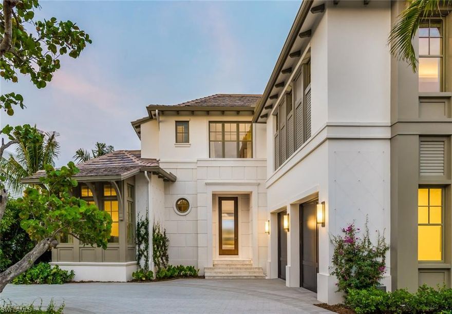 Built by London Bay Homes, this two-story, waterfront grand estate home is designed with a second-floor master suite and private balcony to maximize water views overlooking Cutlass Cove, the southernmost point of scenic Gordon Drive in Port Royal.  Fully furnished by Romanza Interior Design, the home features a study, wine cellar, elevator and a second-floor loft with morning kitchen.  The model’s open floor plan features a spacious great room and adjoining kitchen and dining area. The great room’s wall of stacking sliding glass doors open to an elevated outdoor living area equipped with a summer kitchen, overlooking the linear pool and spa.  The home offers a private boat dock with access to the Gulf of Mexico through nearby Gordon Pass, and includes membership eligibility in the exclusive Port Royal Club and Cutlass Cove Beach Club.