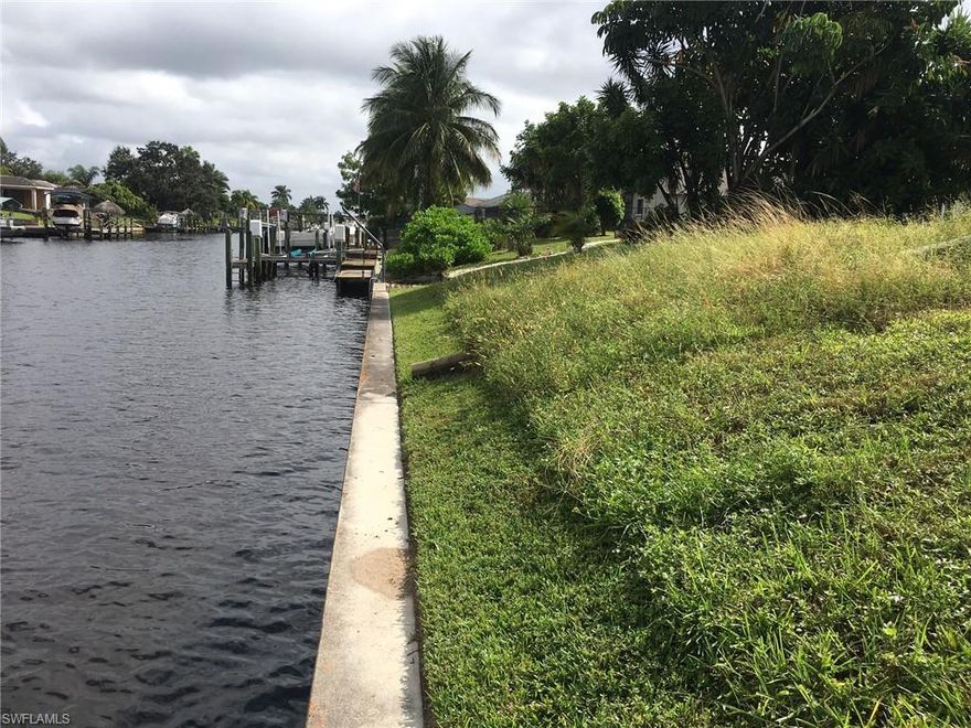 Build Your Waterfront Dream Home Here!  
115' wide Biarritz canal, gulf access lot.  Sea wall in!  High and dry lot with all assessments paid.  Plenty of room for larger boat, house and pool.  Aprox 30 minutes (4 miles) to open water of the Caloosahatchee River.  Only one bridge with one of the highest inland bridge clearance heights in the Cape at 11.3' and you're on your way to the gulf.  Quiet, established neighborhood, with some homes valued over $800k.  Close enough to all the action of Del Prado Boulevard yet far enough not to hear traffic.  Great shopping and dining locations within minutes.  I can help you find the right builder and make your waterfront dream home happen!