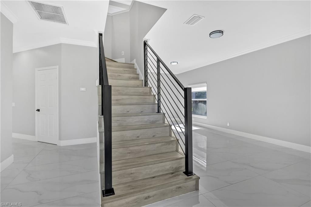 Photo of 2822 Inlet Cove LN W, NAPLES, FL 34120 (MLS # 226005868)