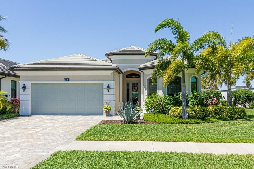 Fantastic 2018 built home in Palazzo in Naples.  This stunning home sits on a corner lot which offers privacy and a great side yard-perfect for the pet owner! Paver driveway, a formal entryway leading to a wonderful open floor plan inside. Volume, tray ceilings with crown molding in every room. Recessed lighting, fans, and tile flooring throughout the home (except for main bedroom). The kitchen has a natural gas cook top, stainless appliances, pantry, large island and separate Dining area. There is a Den/Office, two guest bedrooms, both with crown molding and great closet storage,  and a laundry room with cupboards and sink  The main bedroom is light and bright, has a tray ceiling with crown molding, two fabulous walk-in closets with built-in closet systems and a spacious bathroom with a large shower and dual vanities. Enjoy the Florida lifestyle relaxing on your large lanai, which has plenty of room to add a pool. You are close to local shops, restaurants, the local beaches, and have access to join Quail Creek Golf and Country Club if so desired. Impact windows and doors. Furniture is negotiable (a bonus as furniture can take up to 26 weeks right now to order and receive!)