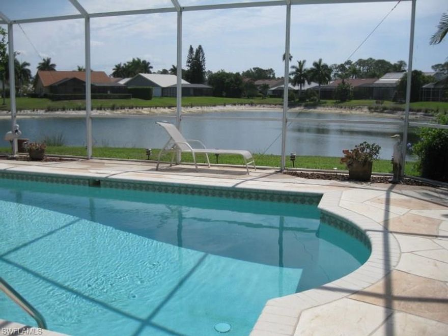 This beautiful home is located in the Countryside Golf and Country Club community.  The home and its sparkling pool overlook one of the community's many lakes.  The home has been newly painted and carpeted, has a separate dining room and the open living concept so desired.  Countryside offers complete resort living with its beautifully maintained 18 hole golf course, brand new fitness center and hard-tru tennis courts,  a wonderful clubhouse with fine and casual dining and a multitude of activities to fit every taste.  And of course, there is Naples itself, with gorgeous beaches, great shopping, art shows and every variety of restaurant.  Make this wonderful world yours.  Come, see, and you'll fall in love with this, your new home in Paradise.