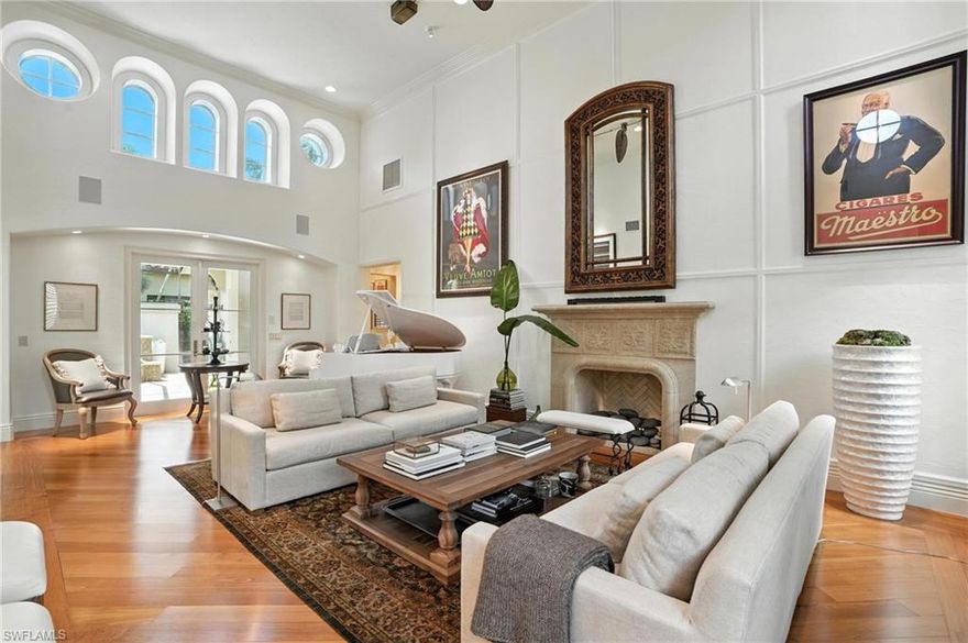 *Exquisite Sophistication wrapped in resort style living at its finest!* This marvel of quality resides within the highly sought after Serafina of Tiburon along Tiburon’s Gold Course. This community and street is straight out of a movie. Eyes will widen and jaws will drop as you pass through the double mahogany door entry and view the 17 foot high great room complete with fireplace, elegant flooring and a wealth of natural light. A gorgeously refreshed kitchen is a chef’s dream accented with a spacious dining space. Open the estate to the outdoors with the slide of your pocket corner sliders and enjoy the spectacular outdoor kitchen, island, living space and custom pool setup. Entertain, relax, nap… your choice with this boastful outdoor space. The primary suite is loaded with a sparkling bath, massive closet, bar, and a tranquility unmatched. Additional spaces include 2 highly appointed guest bedrooms and baths, a secondary den or family space, an epoxy and built-in finished oversized garage, and extreme attention to detail in the construction and finishes of this truly magnificent residence. Home is furnished with high end touches to make your move in easy. Live your best life here. Video Tour available.*