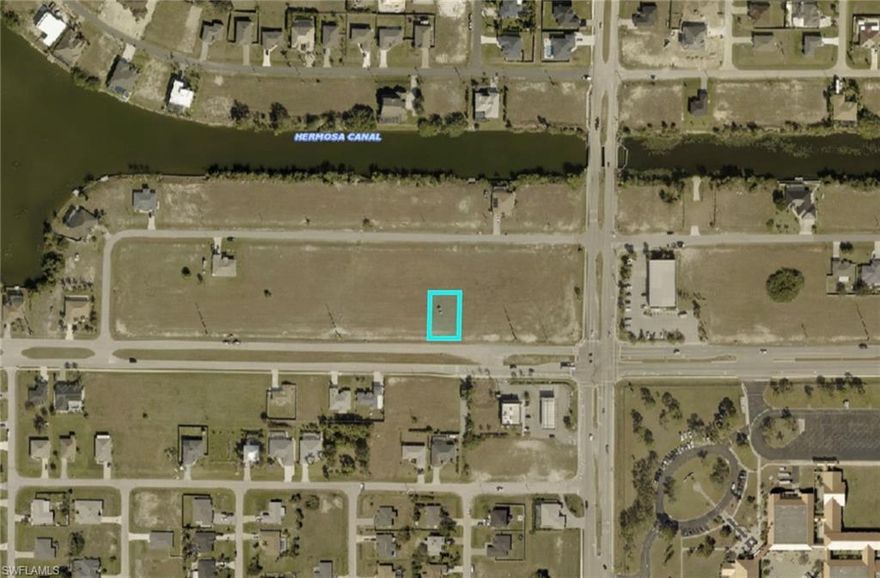 Prime commercial lot directly across from a rapidly growing and highly regarded school. This 10,019 sq ft parcel boasts an impressive 80 ft of frontage and 125 ft depth, offering abundant space for a variety of commercial opportunities. Zoned for commercial use, this property represents a smart investment in an expanding area. With development and demand increasing, commercial lots like this are poised to be highly sought after in the near future—secure your spot in this growing community today.