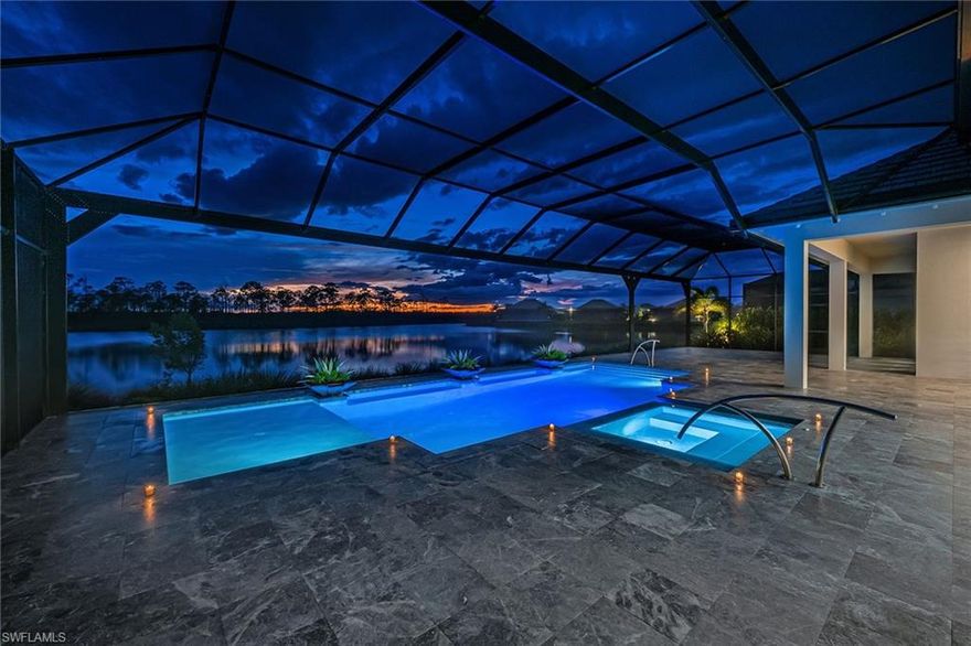 Brand new construction within minutes to downtown 5th Avenue. A Stock construction custom residence offering an unparalleled living experience with four spacious bedrooms, a den or office/flex room, five baths and nearly 3,600 square feet of luxurious, air-conditioned space. Between the sugary white sands of the Gulf and the vibrant shopping, dining, and entertainment hub of downtown Naples and 5th Avenue arrives a new construction home. As you step inside, you’ll be captivated by the exquisite custom coffered ceilings and meticulous craftsmanship that define this newly built Stock custom estate home. Hurricane impact windows and sliders amplify the jaw-dropping and unobstructed lake views that promise tranquility and beauty from every angle. The expansive primary suite is a sanctuary, featuring an oversized walk-in shower and a lavish soaking tub, ideal for unwinding after a long day. Every detail has been carefully considered with intricate cabinetry and countertop finishes that add bespoke sophistication to the entire residence. Other features include a chef's kitchen with natural gas cooking, a private heated saltwater pool and spa oasis for relaxation, nearly 1/3-acre lot size, a private gated entry and access to all that Isles of Collier has to offer. The Isles of Collier Preserve captures the timeless architecture and traditions of Old Naples. Over half the 2,400 acres is dedicated to lakes, nature preserves and natural habitats. Overlooking miles of scenic kayak and biking trails along the Cypress Waterway, The Isles Club offers a classic old Florida clubhouse, a state-of-the-art fitness center, Overlook Bar & Grill, resort-style and lap pools, tennis and pickleball, hiking and biking trails, two kayak launches and eight miles of kayaking, paddleboarding, and catch and release fishing. Don’t miss your chance to own this magnificent piece of Naples real estate.