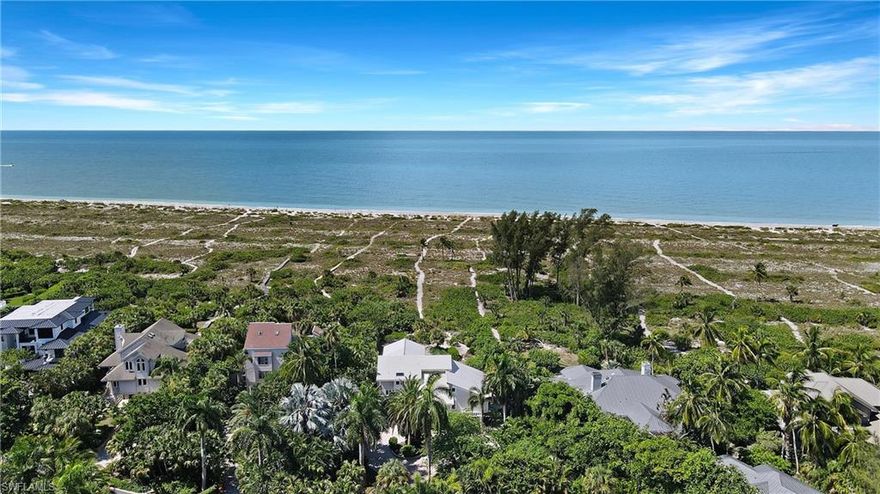 Located on Sanibel's west end, ensuring low-density beaches perfect for those seeking unparalleled seclusion and privacy, is this beautiful and inviting beachfront home. Optimally built on high ground and set forward of the neighboring home gives this property unparalleled panoramic views of Gulf waters and sugar sand beaches as far as the eye can see. Featuring three spacious bedrooms, all en-suite, plus another full bath (three-bedroom, four-bath) plus loft and recreation room, make this home the perfect getaway or wonderful retreat. Updated by Decorte Four Home Builders, this home had new impact windows and sliders installed in 2011 and a new pool, spa and deck added by Coastal Custom Home Building in 2011. The primary suite occupies the entire top-level ensuring it has the utmost privacy and the best views possible and features vaulted ceilings, private sundeck, expansive walk-in closet, plus loft/office with additional walk-in storage space. Your private path leads directly to the sand and waves where your tropical dream begins.
