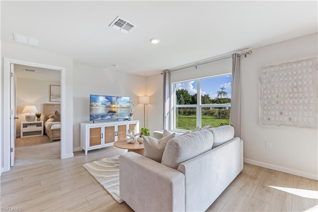 Photo of 105 NE 22ND AVE, CAPE CORAL, FL 33909 (MLS # 225082898)